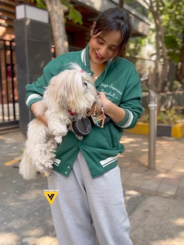 Neha sharma cutie look with dog..