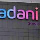 Adani Group Chairman Withdraws Share Sale to Insulate Investors from Losses