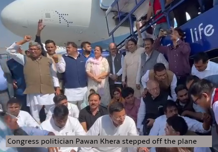 Congress politician Pawan Khera, stepped off the plane,