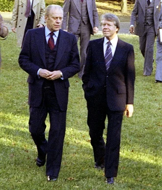 President Ford and President Elect Jimmy Carter Walking Through the Rose Garden Prior to Their Meeting to Discuss the Presidential Transition NARA 45644333 1.jpg