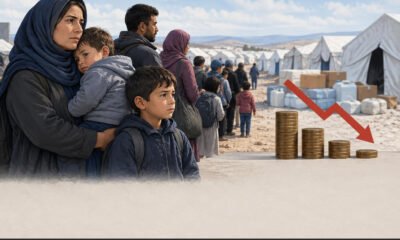 Refugee family receiving humanitarian aid